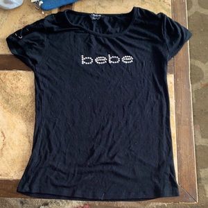 Bebe rhinestone Chris cross sleeves